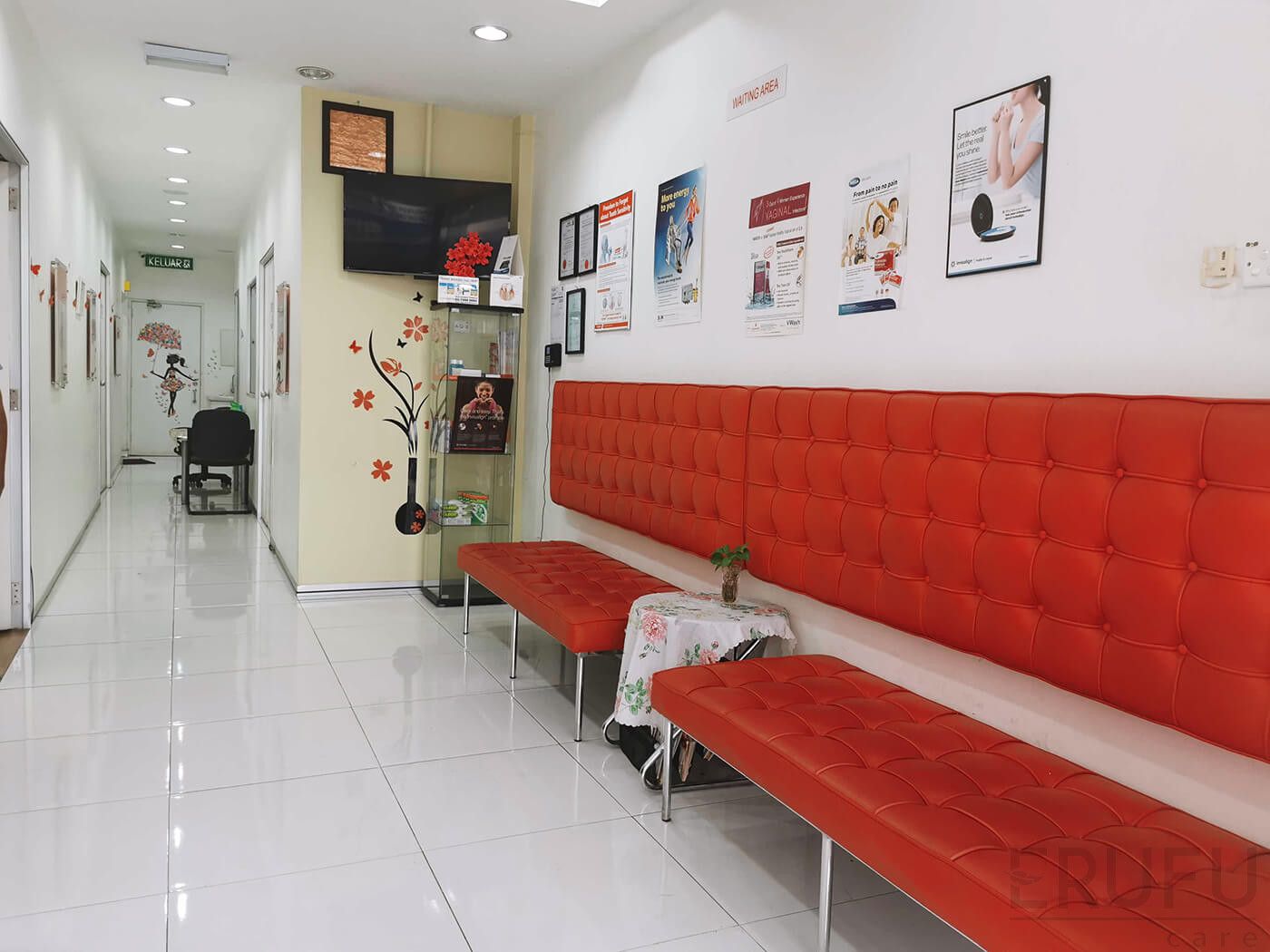 Modern clinical room with custom seating and architectural lighting