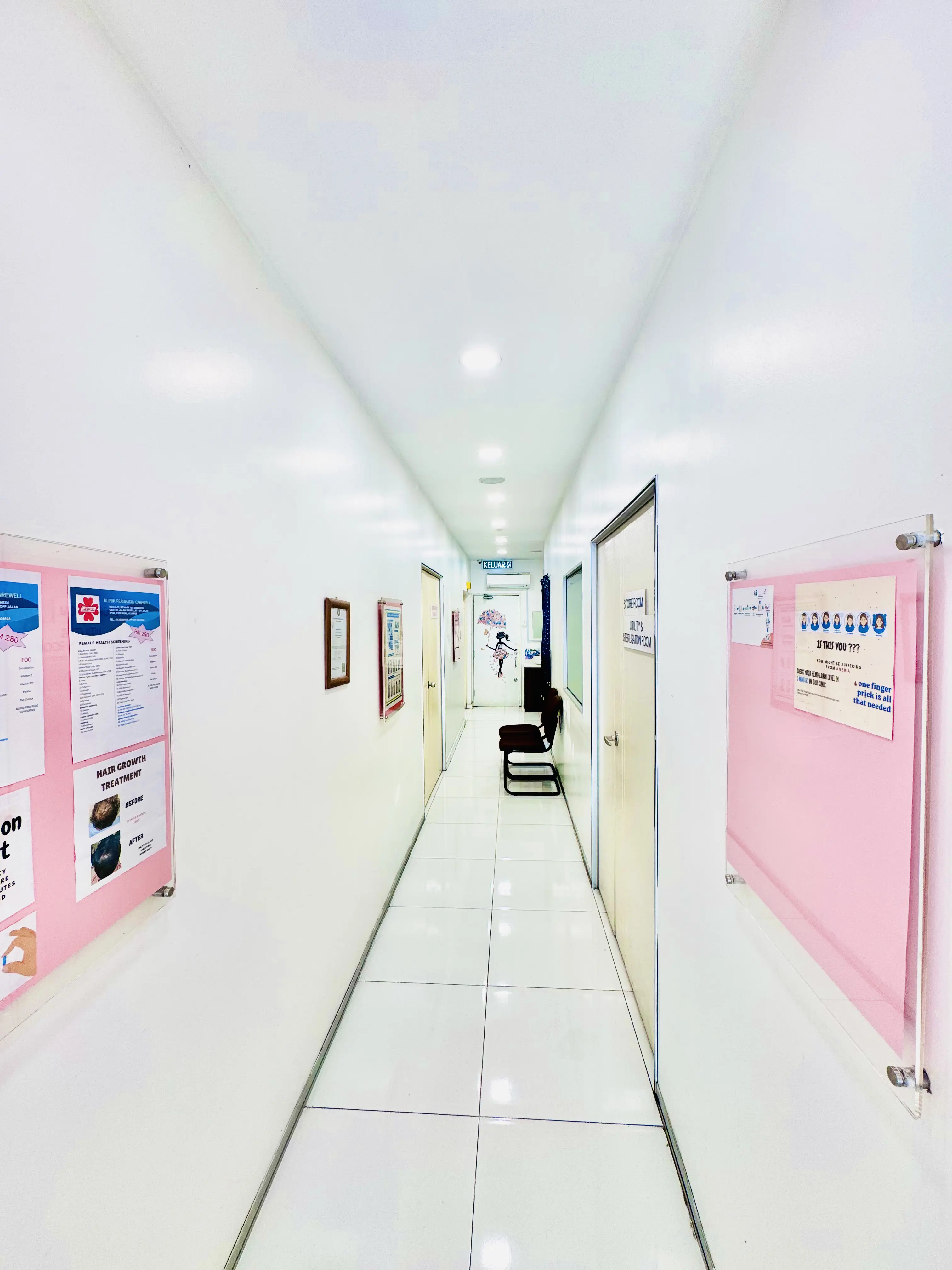 Wide shot of clinical gallery hallway